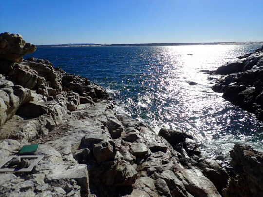 the rocky beach where the project is deployed